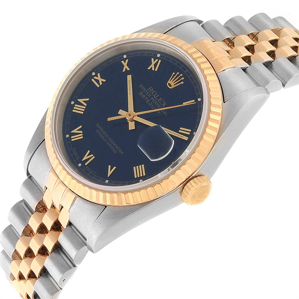 The image shows a Rolex Datejust 16233 Men's Steel and Gold (two tone) Blue Dial 16233 Men's Steel and Gold (two tone) Blue Dial watch at a slight side angle, highlighting the face, bezel, crown, and part of the bracelet.
