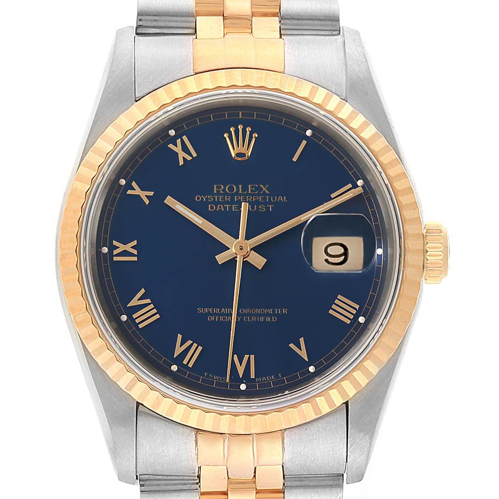 The image shows a front view of a Rolex Datejust 16233 Men's Steel and Gold (two tone) Blue Dial 16233 Men's Steel and Gold (two tone) Blue Dial watch, highlighting its blue dial, Roman numerals, gold fluted bezel, and two-tone bracelet.