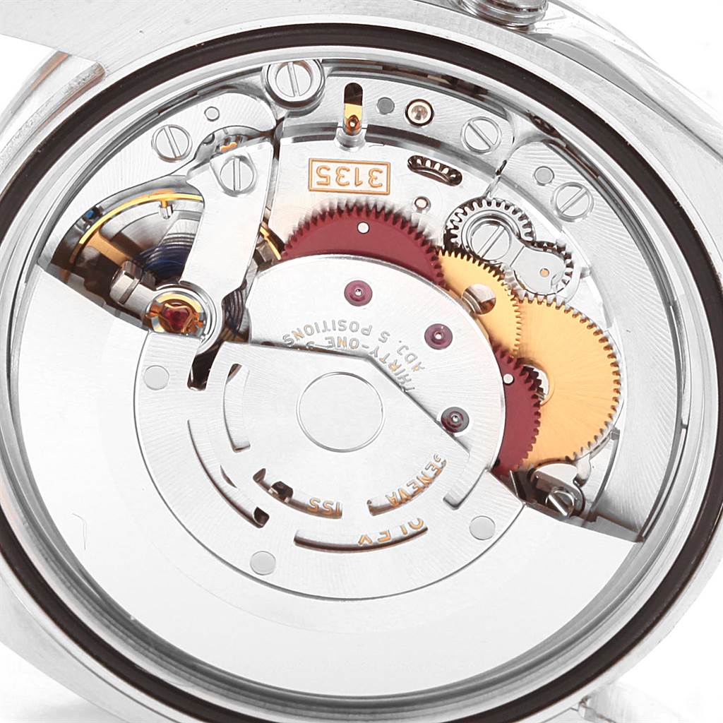 This image shows the inner mechanical movement parts of a Rolex Datejust 116244 Men's Stainless Steel Blue Dial 116244 Men's Stainless Steel Blue Dial watch viewed from the back.