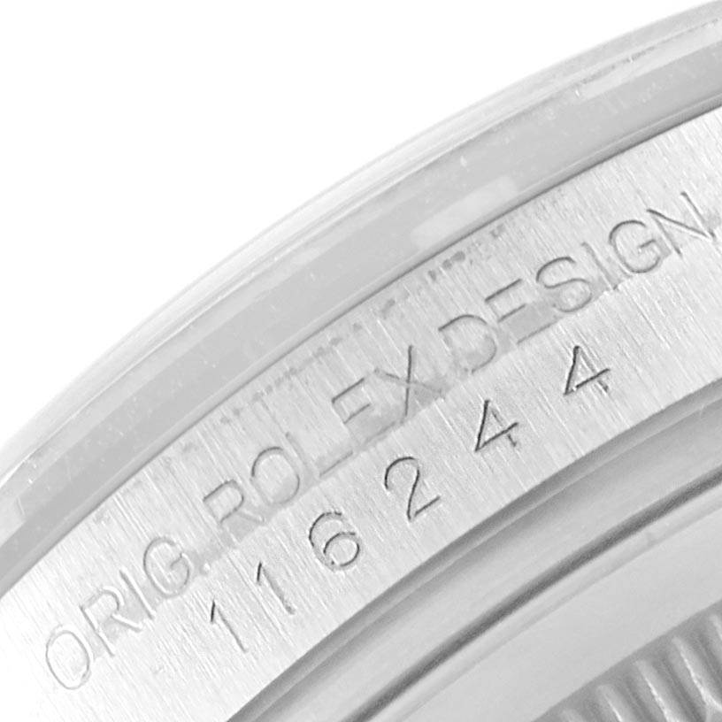 This image shows a close-up of the side view of the case with the model number and "ROLEX DESIGN" engraved on the Rolex Datejust 116244 Men's Stainless Steel Blue Dial 116244 Men's Stainless Steel Blue Dial watch.