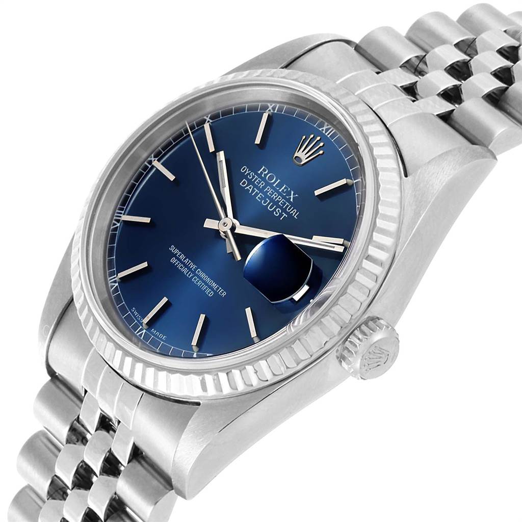 The image displays a Rolex Datejust 16234 Men
s Stainless Steel Blue Dial 16234 Men
s Stainless Steel Blue Dial watch at a three-quarter angle, highlighting the blue dial, fluted bezel, and part of the jubilee bracelet.