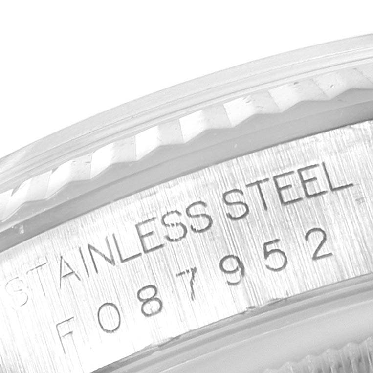 This image shows the engraved stainless steel case with a serial number of a Rolex Datejust 16234 Men
s Stainless Steel Blue Dial 16234 Men
s Stainless Steel Blue Dial watch.