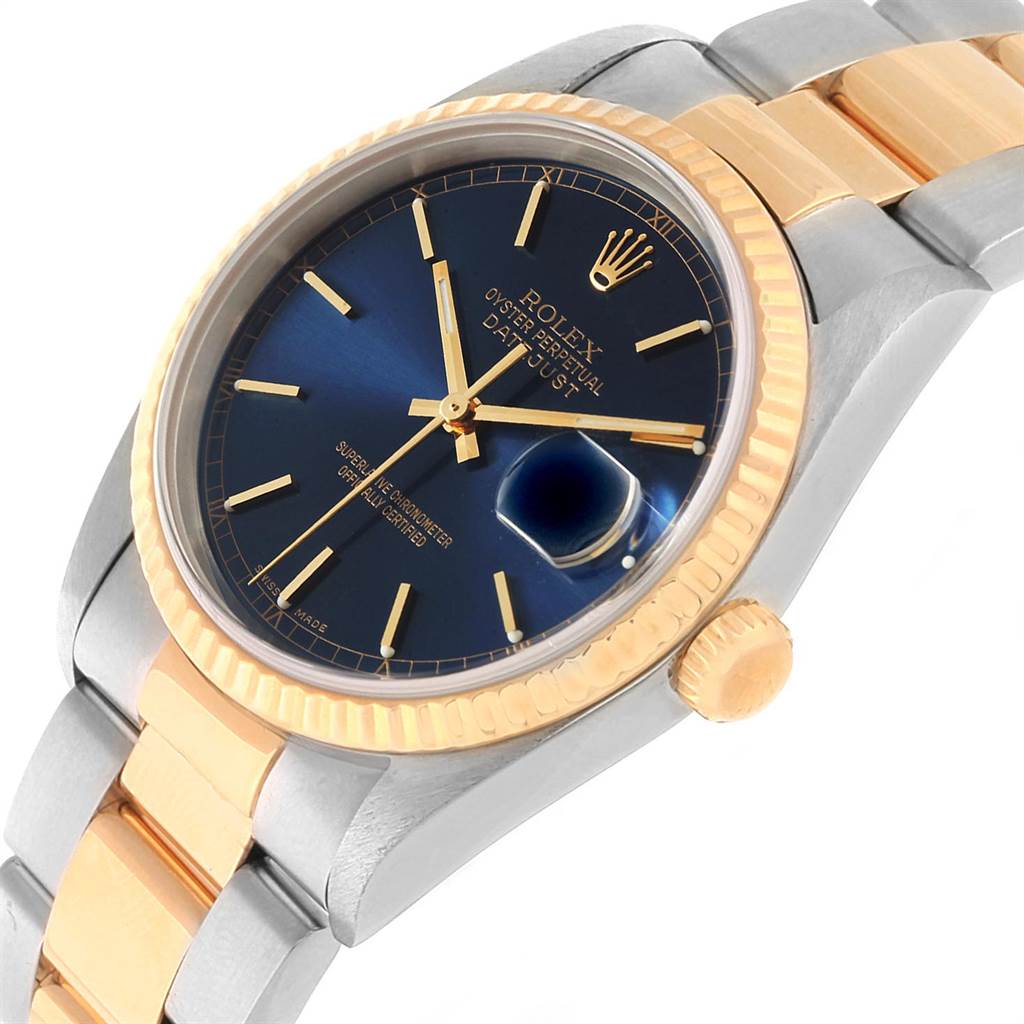 The image shows a close-up angle of a Rolex Datejust 16233 Men's Steel and Gold (two tone) Blue Dial 16233 Men's Steel and Gold (two tone) Blue Dial watch, highlighting the dial, bezel, and a portion of the bracelet.