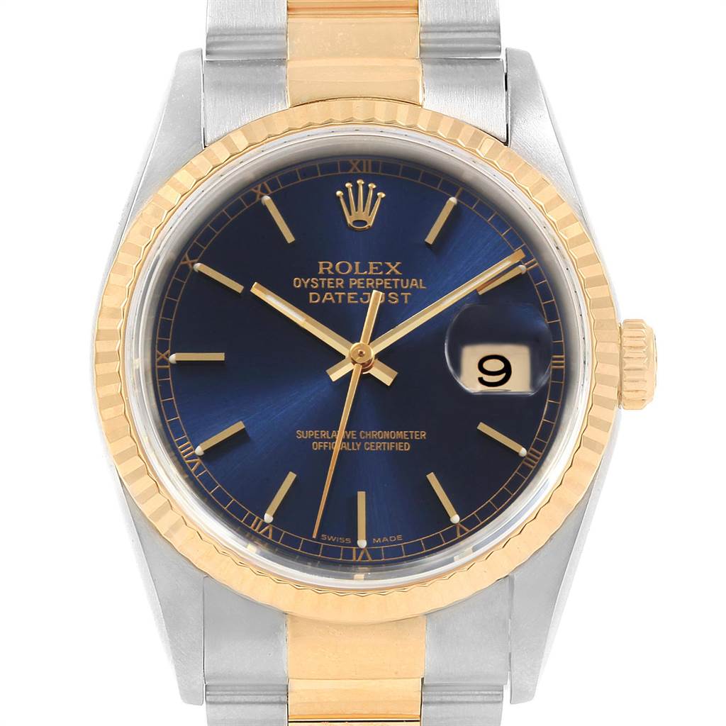 The image shows a Rolex Datejust 16233 Men's Steel and Gold (two tone) Blue Dial 16233 Men's Steel and Gold (two tone) Blue Dial watch from a front angle, highlighting the blue dial and the gold and silver bracelet.