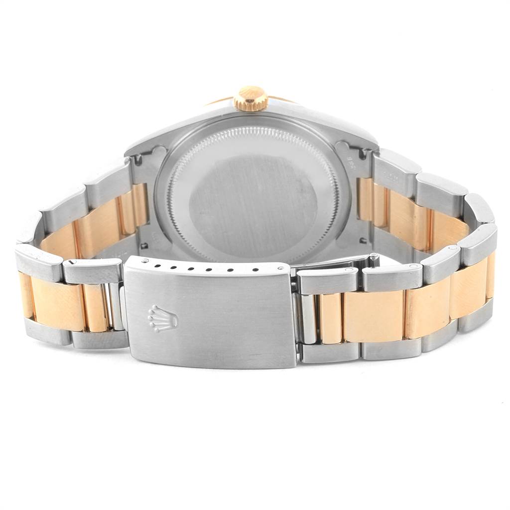 The image shows the back of the casing, clasp, and band of a Rolex Datejust 16233 Men's Steel and Gold (two tone) Blue Dial 16233 Men's Steel and Gold (two tone) Blue Dial watch.