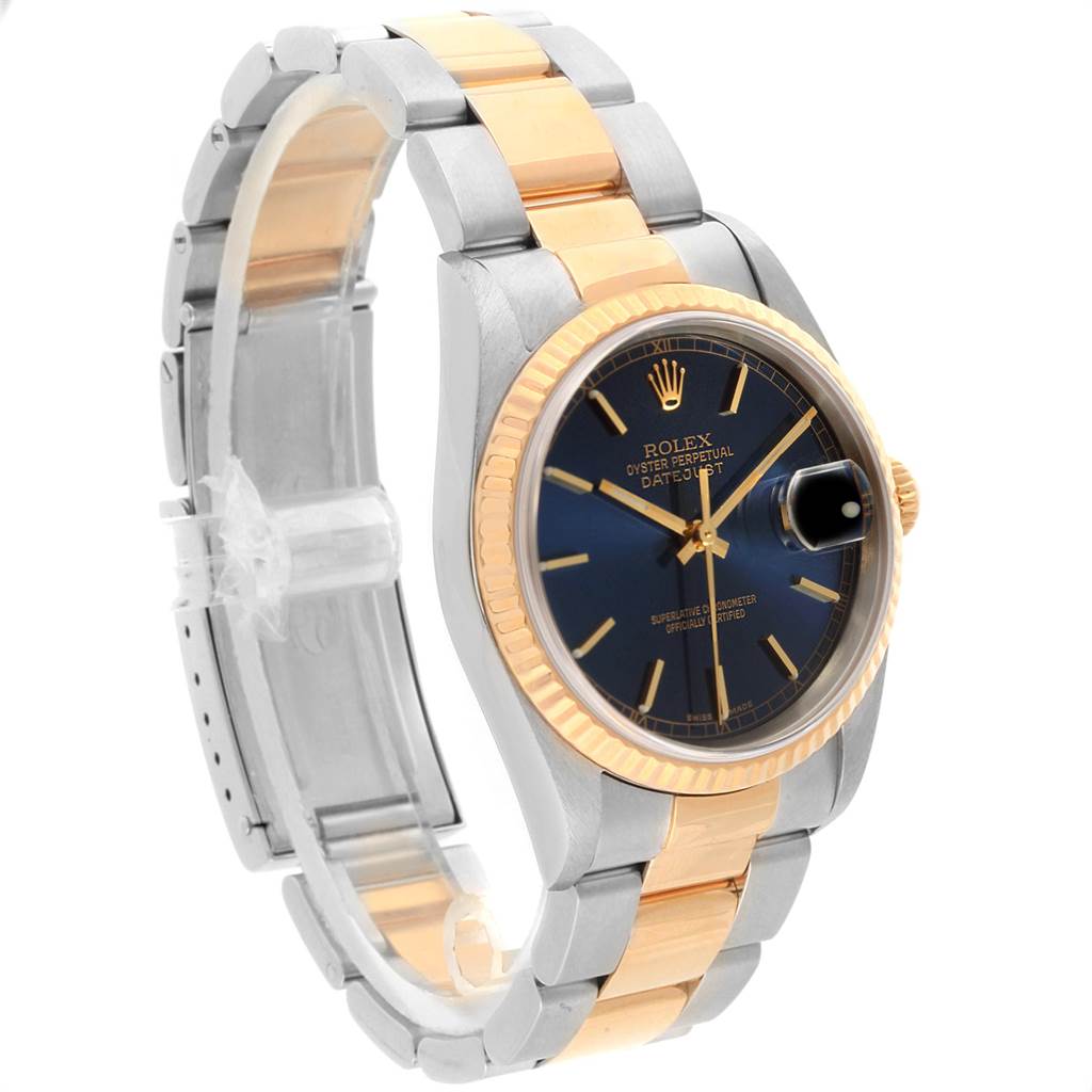 The image shows a side angle of the Rolex Datejust 16233 Men's Steel and Gold (two tone) Blue Dial 16233 Men's Steel and Gold (two tone) Blue Dial watch, highlighting its two-tone bracelet, bezel, and dark dial face.