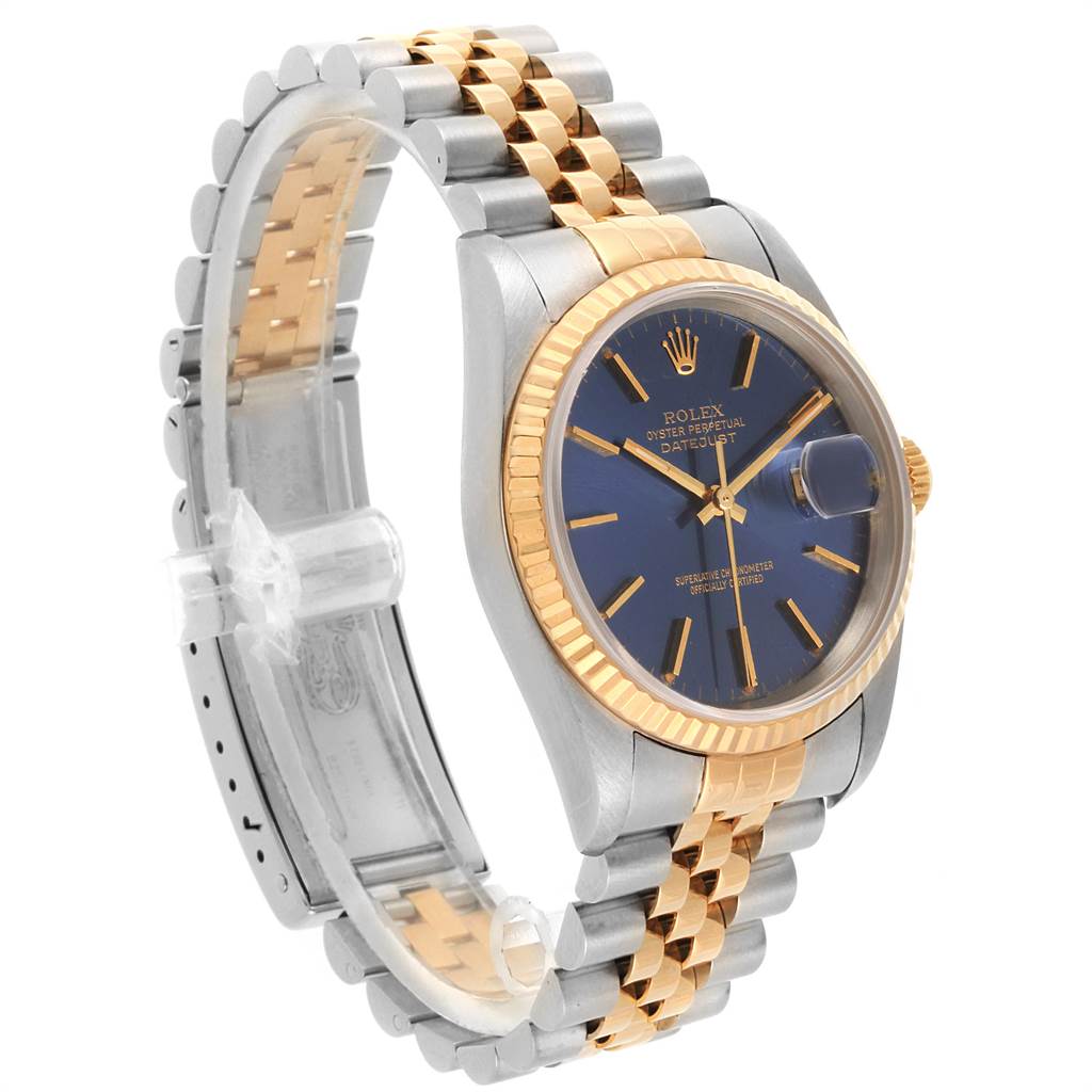 This is a side view angle showing the face, bracelet, and crown of the Rolex Datejust 16233 Men
s Steel and Gold (two tone) Blue Dial 16233 Men
s Steel and Gold (two tone) Blue Dial watch.