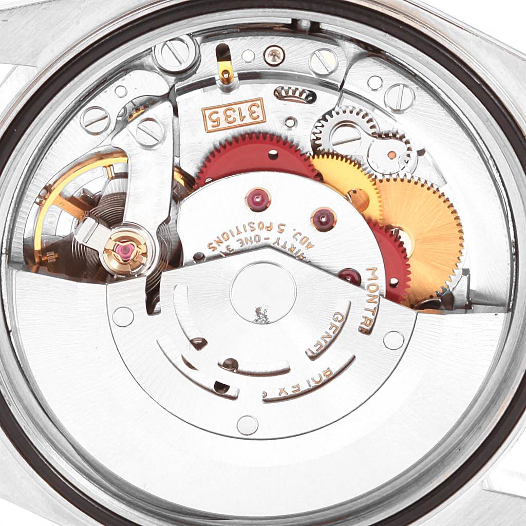 This image shows the internal mechanism of the Rolex Datejust 16233 Men
s Steel and Gold (two tone) Blue Dial 16233 Men
s Steel and Gold (two tone) Blue Dial watch from a macro view angle.