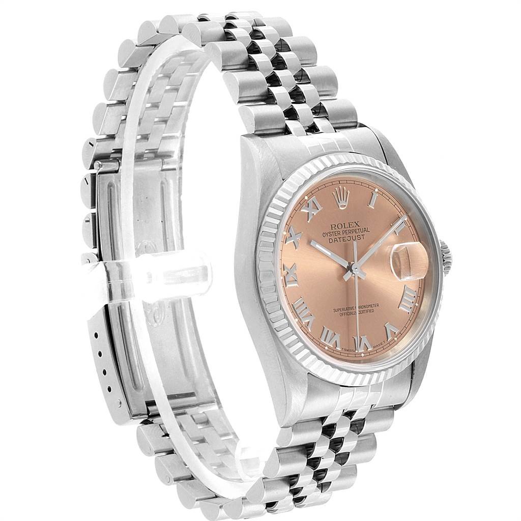 The image shows a Rolex Datejust 16234 Men
s Stainless Steel Pink Dial 16234 Men
s Stainless Steel Pink Dial watch angled to display its face, bracelet, and side view of the casing.