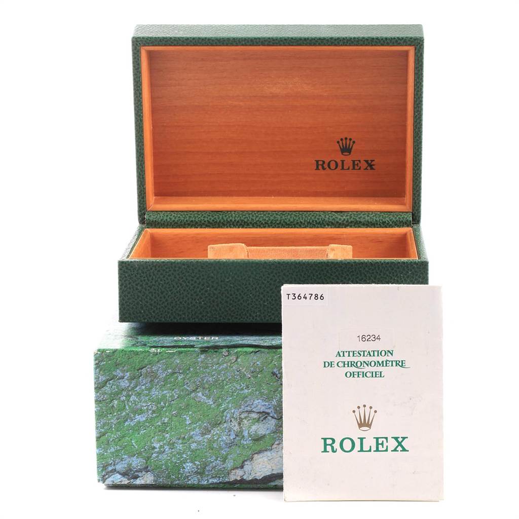 The image shows the open box and certification papers for a Rolex Datejust 16234 Men
s Stainless Steel Pink Dial 16234 Men
s Stainless Steel Pink Dial model.