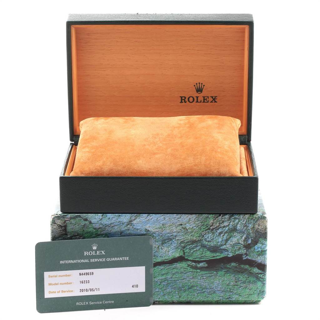A Rolex Datejust 16233 Men's Steel and Gold (two tone) Champagne Dial 16233 Men's Steel and Gold (two tone) Champagne Dial watch box with an open lid and a service guarantee card is shown from a front angle.