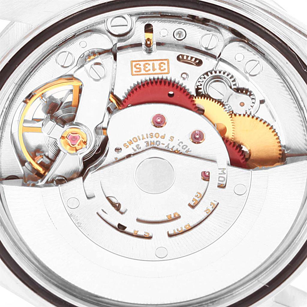 This is an inner view of the movement of a Rolex Datejust 16234 Men's Stainless Steel Silver Dial 16234 Men's Stainless Steel Silver Dial watch, showing gears and mechanical components.