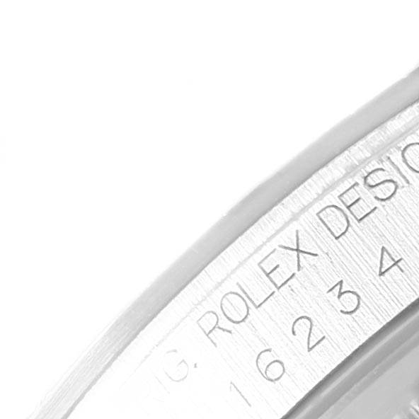 The image shows an angled close-up of the inner bezel with engraving on the Rolex Datejust 16234 Men's Stainless Steel Blue Dial 16234 Men's Stainless Steel Blue Dial watch.