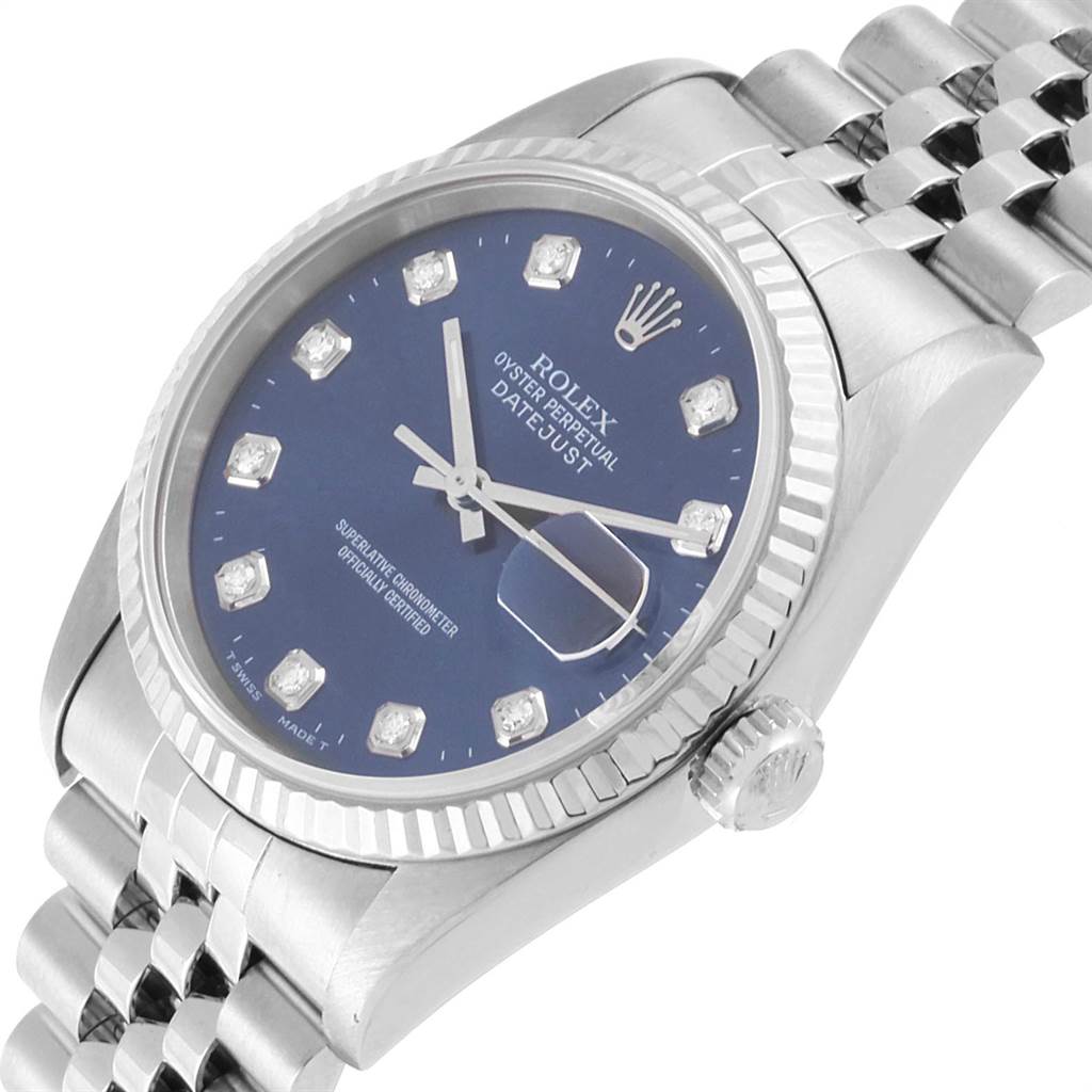 The image shows a side view of the Rolex Datejust 16234 Men's Stainless Steel Blue Dial 16234 Men's Stainless Steel Blue Dial watch, highlighting its blue dial with diamond markers, fluted bezel, and Jubilee bracelet.