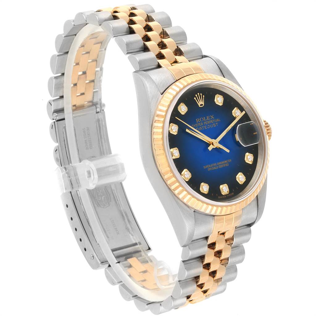 The image shows a Rolex Datejust 16233 Men's Steel and Gold (two tone) Blue Dial 16233 Men's Steel and Gold (two tone) Blue Dial watch at a slight angle, highlighting the case, dial, bezel, and bracelet.