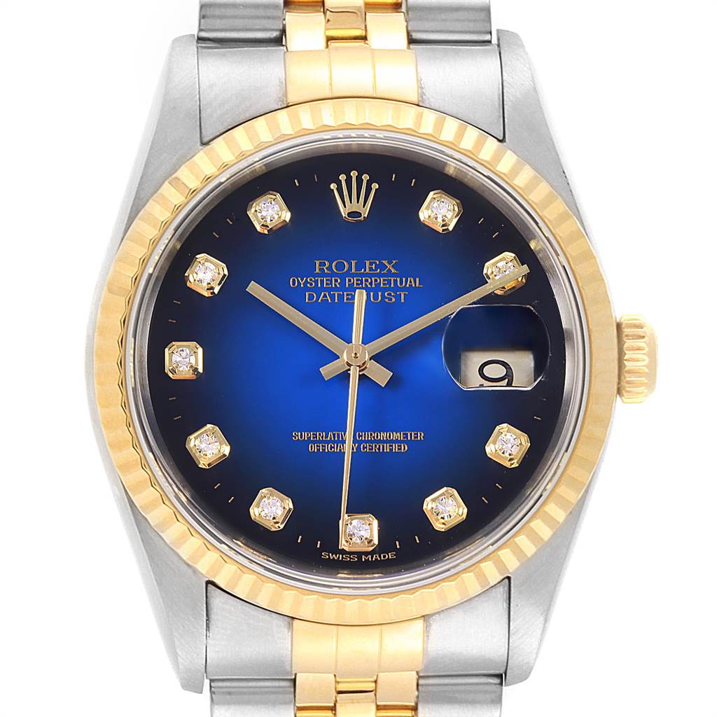 This Rolex Datejust 16233 Men's Steel and Gold (two tone) Blue Dial 16233 Men's Steel and Gold (two tone) Blue Dial watch is shown from the front, highlighting the dial, hands, hour markers, and date window.