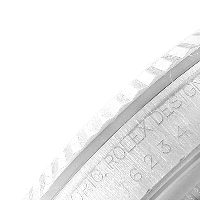 This image shows a close-up of the bezel and edge of the dial of a Rolex Datejust 16234 Men's Stainless Steel Mother of Pearl Dial 16234 Men's Stainless Steel Mother of Pearl Dial watch.