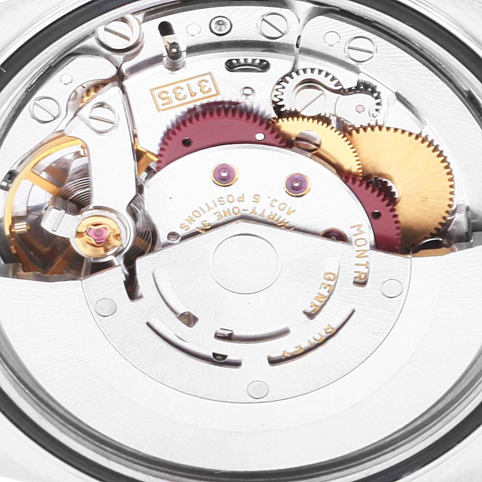 This image shows the inner mechanical movement of a Rolex Datejust 16234 Men's Stainless Steel Mother of Pearl Dial 16234 Men's Stainless Steel Mother of Pearl Dial watch.