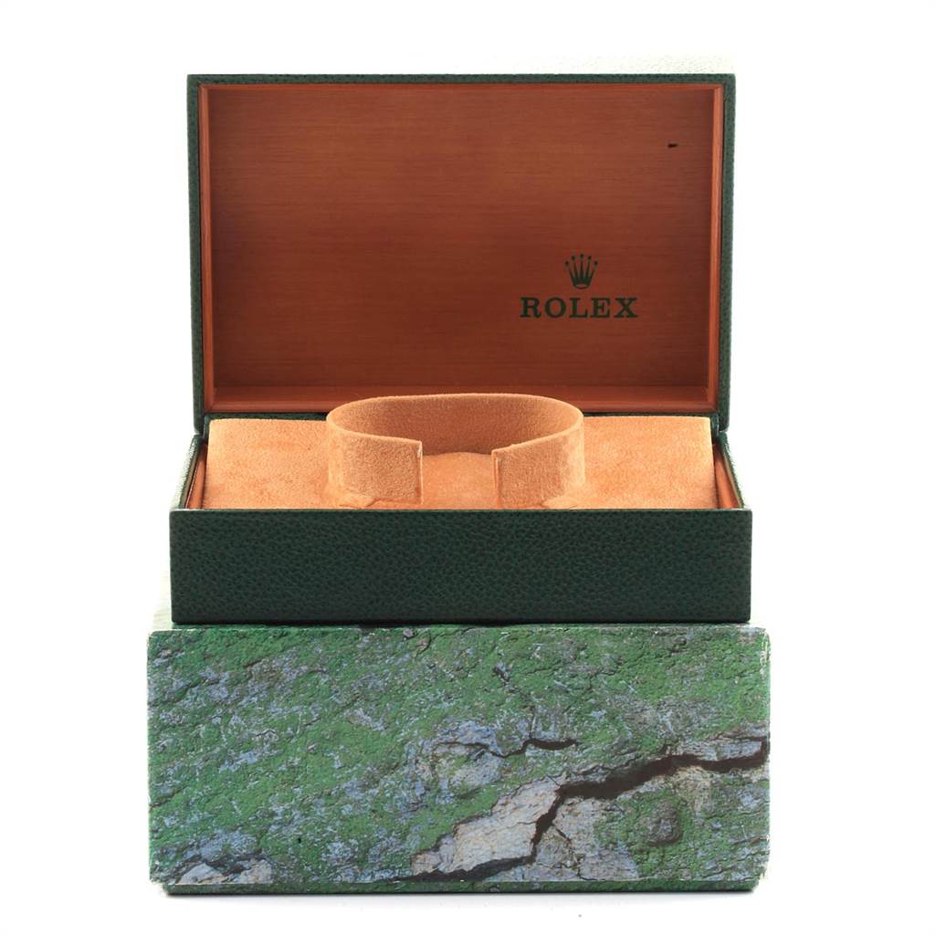 This image shows an open Rolex Datejust 16233 Men's Steel and Gold (two tone) White Dial 16233 Men's Steel and Gold (two tone) White Dial watch box, viewed from the front, displaying the watch holder inside.