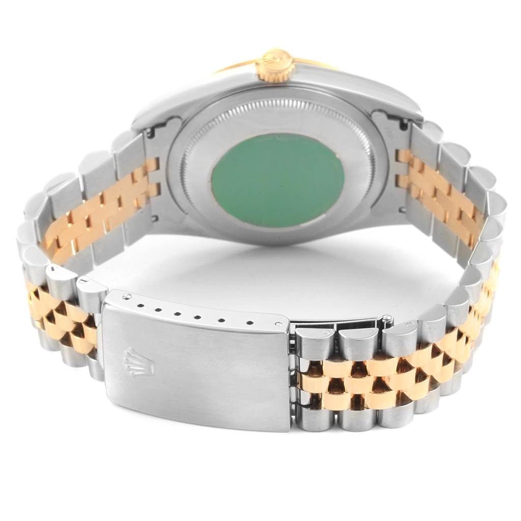 This image shows the Rolex Datejust 16233 Men's Steel and Gold (two tone) White Dial 16233 Men's Steel and Gold (two tone) White Dial watch from the back, including the case back, crown, and the two-tone Jubilee bracelet with a clasp.