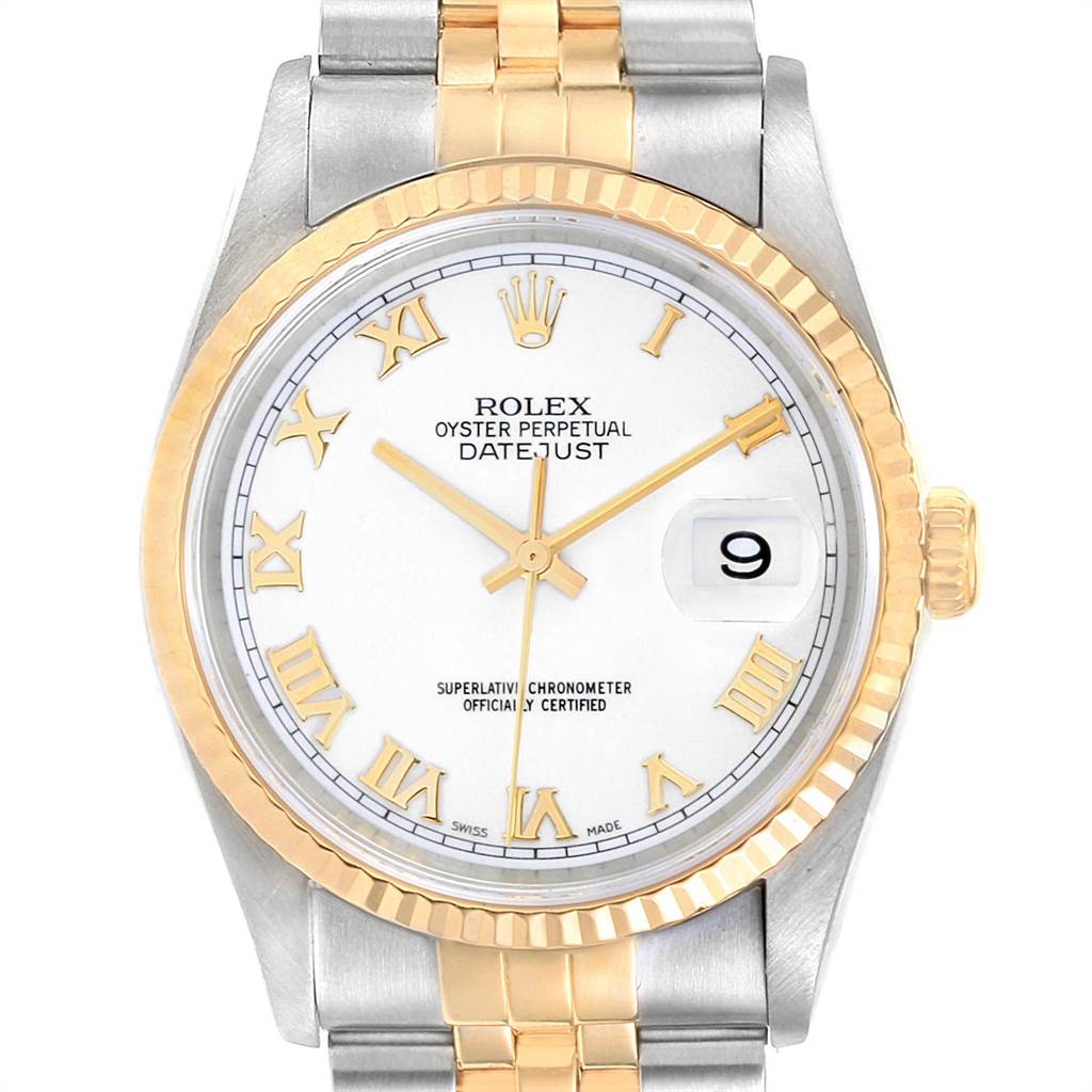 The Rolex Datejust 16233 Men
s Steel and Gold (two tone) White Dial 16233 Men
s Steel and Gold (two tone) White Dial watch is shown from a top-down angle, displaying its face, fluted bezel, and part of its two-tone bracelet.