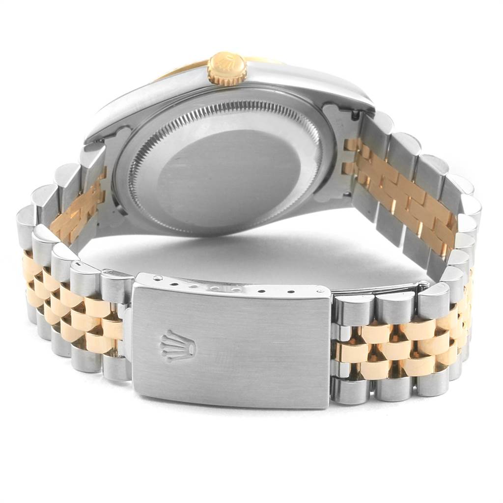This image shows the back case, crown, and Jubilee bracelet of a Rolex Datejust 16233 Men
s Steel and Gold (two tone) White Dial 16233 Men
s Steel and Gold (two tone) White Dial watch.