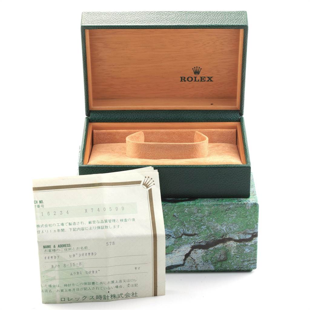 The image shows an open Rolex Datejust 16234 Men's Stainless Steel Blue Dial 16234 Men's Stainless Steel Blue Dial watch box and accompanying paperwork.