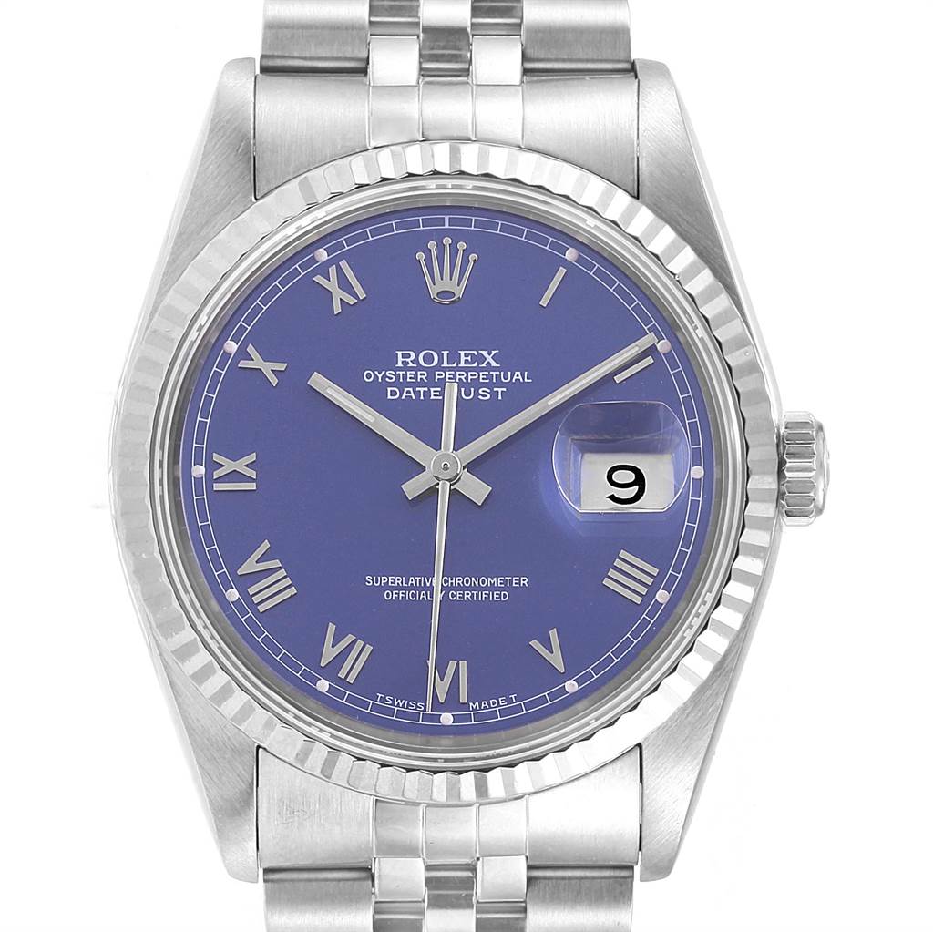 The image shows a front view of a Rolex Datejust 16234 Men's Stainless Steel Blue Dial 16234 Men's Stainless Steel Blue Dial watch, featuring a blue dial, Roman numerals, and the date magnified at three o'clock.