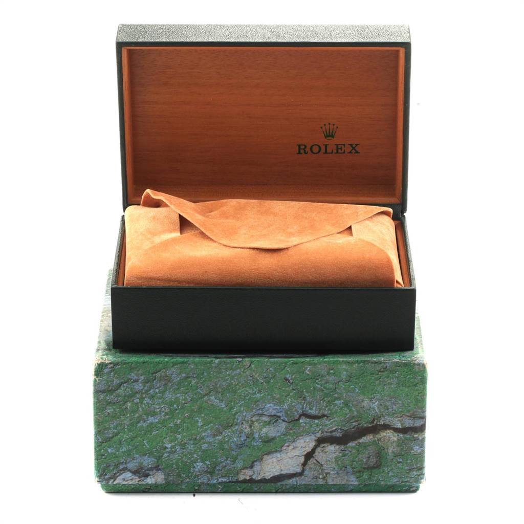 The image shows the packaging for a Rolex Datejust 16233 Men's Steel and Gold (two tone) Grey Dial 16233 Men's Steel and Gold (two tone) Grey Dial watch, including a green outer box and an open brown inner box with a watch cushion.