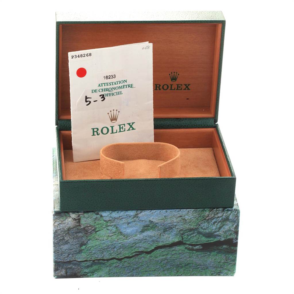 This image shows an open Rolex Datejust 16233 Men's Steel and Gold (two tone) Grey Dial 16233 Men's Steel and Gold (two tone) Grey Dial watch box, certificate, and cushioned watch holder, viewed from the front.