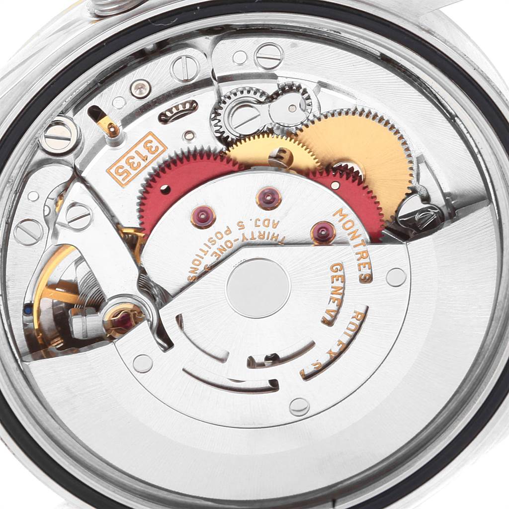 This image shows a close-up view of the movement mechanism inside a Rolex Datejust 16233 Men's Steel and Gold (two tone) Grey Dial 16233 Men's Steel and Gold (two tone) Grey Dial watch.