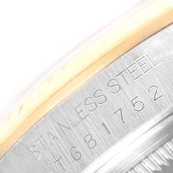 The image shows a close-up of the side of the bezel and case back of a Rolex Datejust 16233 Men's Steel and Gold (two tone) Silver Dial 16233 Men's Steel and Gold (two tone) Silver Dial watch, highlighting the "STAINLESS STEEL" engraving.