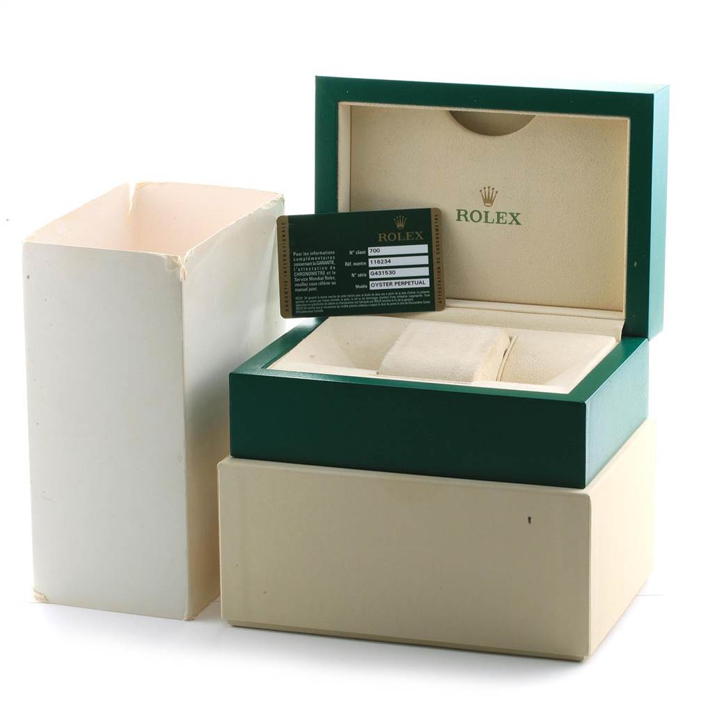 The image shows an open Rolex Datejust 116234 Men's Stainless Steel Blue Dial 116234 Men's Stainless Steel Blue Dial watch box with certification cards and packaging.