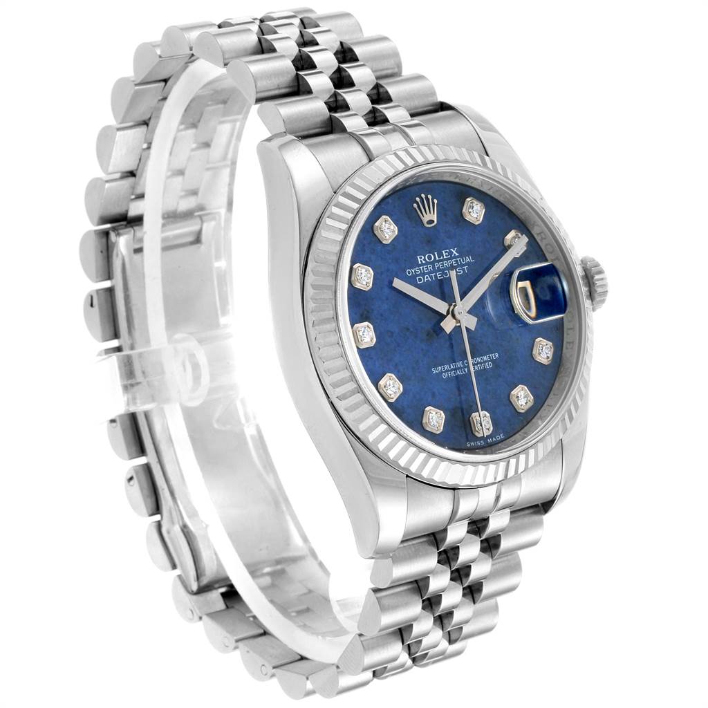 The image shows a Rolex Datejust 116234 Men's Stainless Steel Blue Dial 116234 Men's Stainless Steel Blue Dial watch from a three-quarter angle, highlighting its blue dial, fluted bezel, and stainless steel jubilee bracelet.
