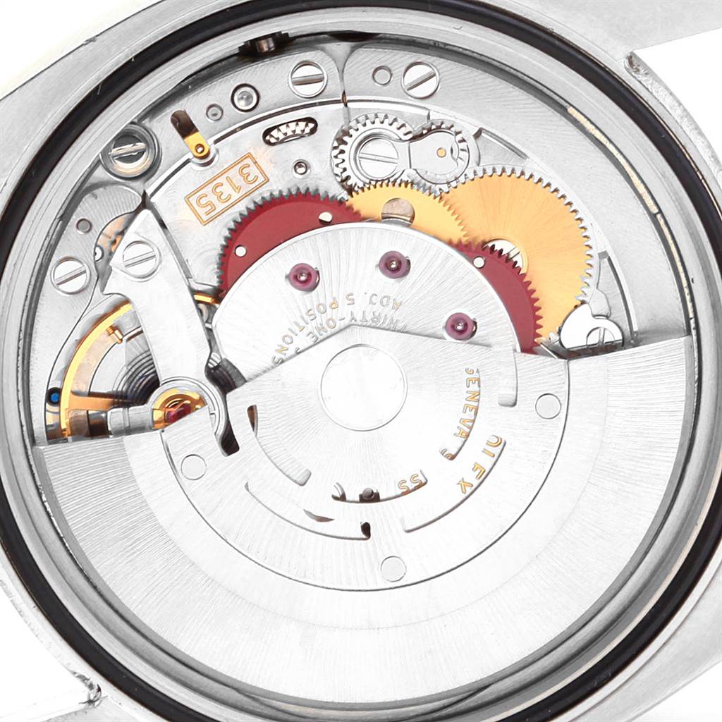 This image shows the internal mechanism and movement of a Rolex Datejust 116234 Men's Stainless Steel Blue Dial 116234 Men's Stainless Steel Blue Dial watch viewed from the back.