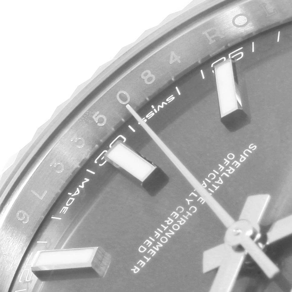 This image shows a close-up angle of the dial, hands, and part of the bezel of a Rolex Datejust 126334 Men
s Stainless Steel Grey Dial 126334 Men
s Stainless Steel Grey Dial watch.