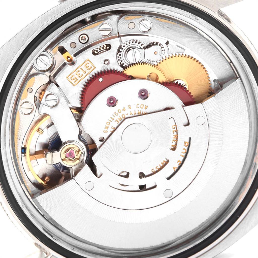 The image shows a close-up of the movement mechanism inside a Rolex Datejust 116234 Men's Stainless Steel Mother of Pearl Dial 116234 Men's Stainless Steel Mother of Pearl Dial watch from the back.