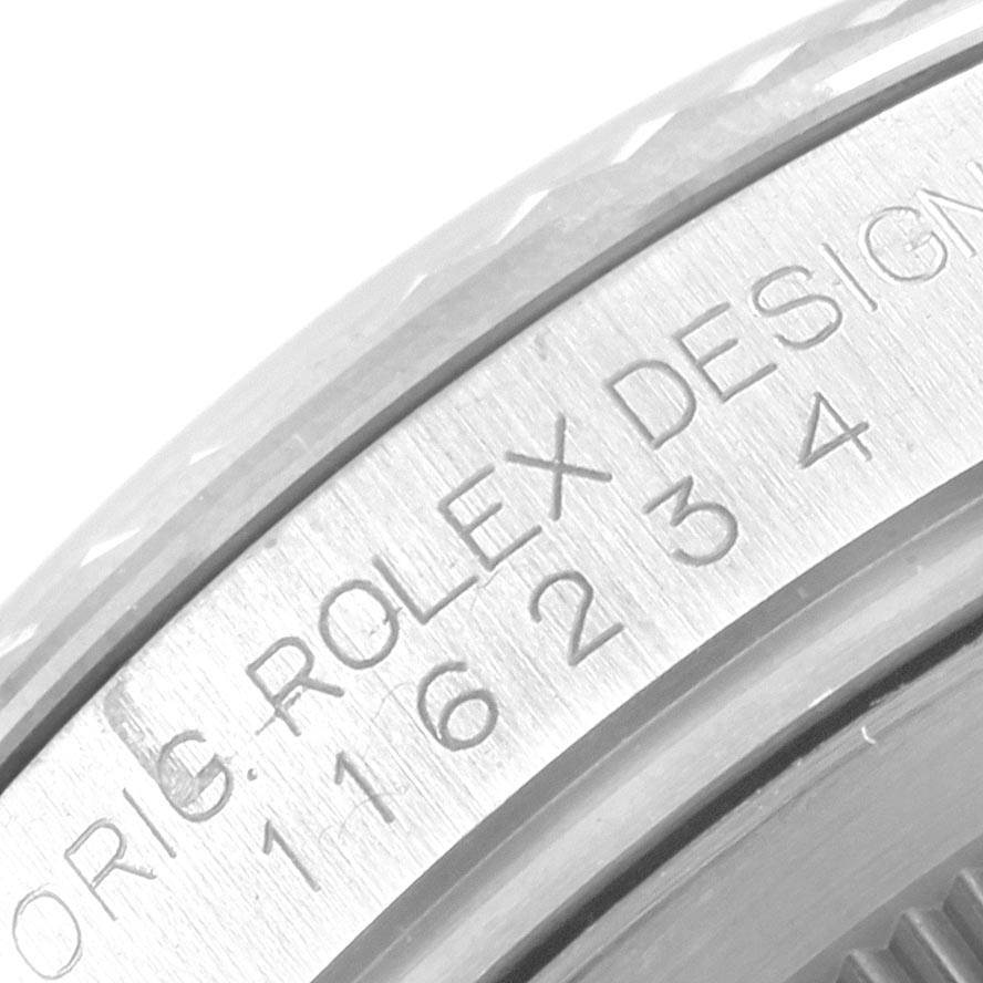 This close-up image shows the engraving on the stainless steel case side of a Rolex Datejust 116234 Men's Stainless Steel Mother of Pearl Dial 116234 Men's Stainless Steel Mother of Pearl Dial watch.