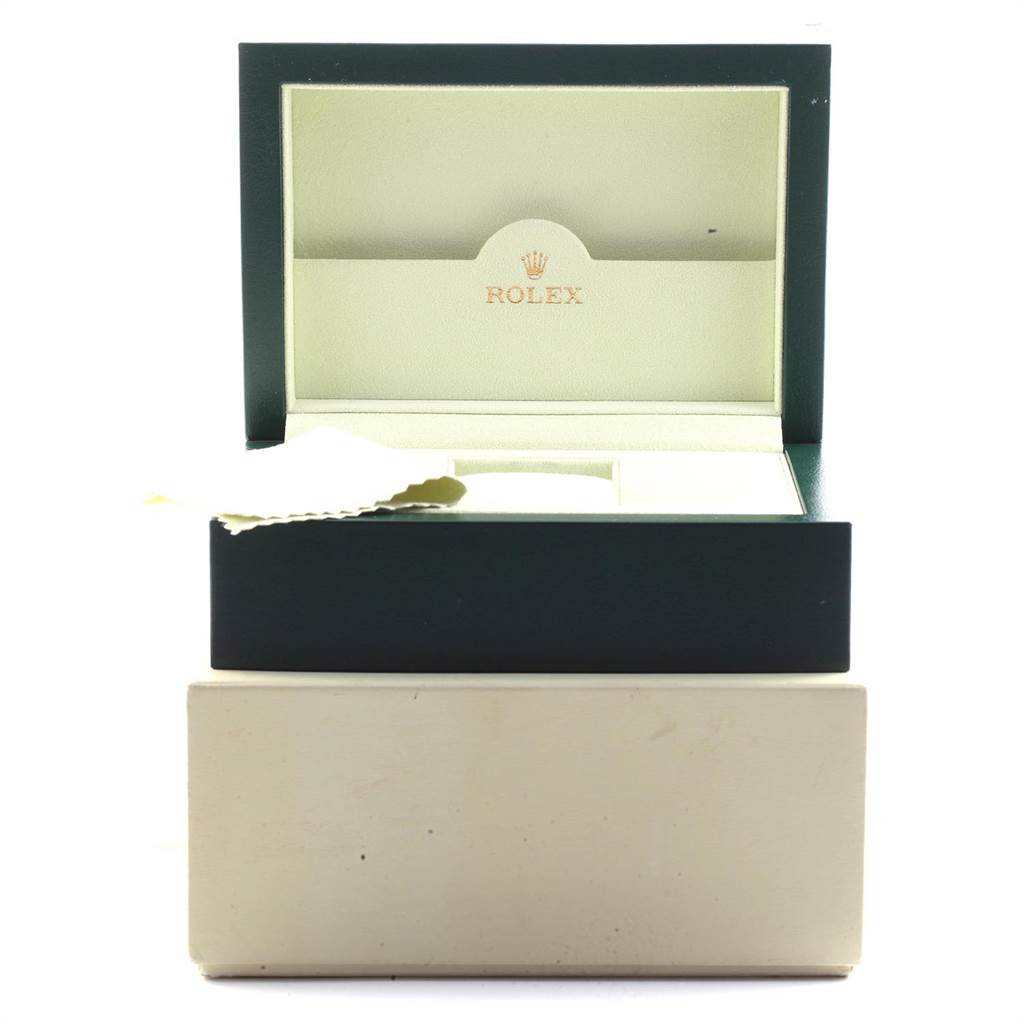 The image shows an open green Rolex Datejust 116234 Men's Stainless Steel Mother of Pearl Dial 116234 Men's Stainless Steel Mother of Pearl Dial watch box with inner cushioning and a cleaning cloth.