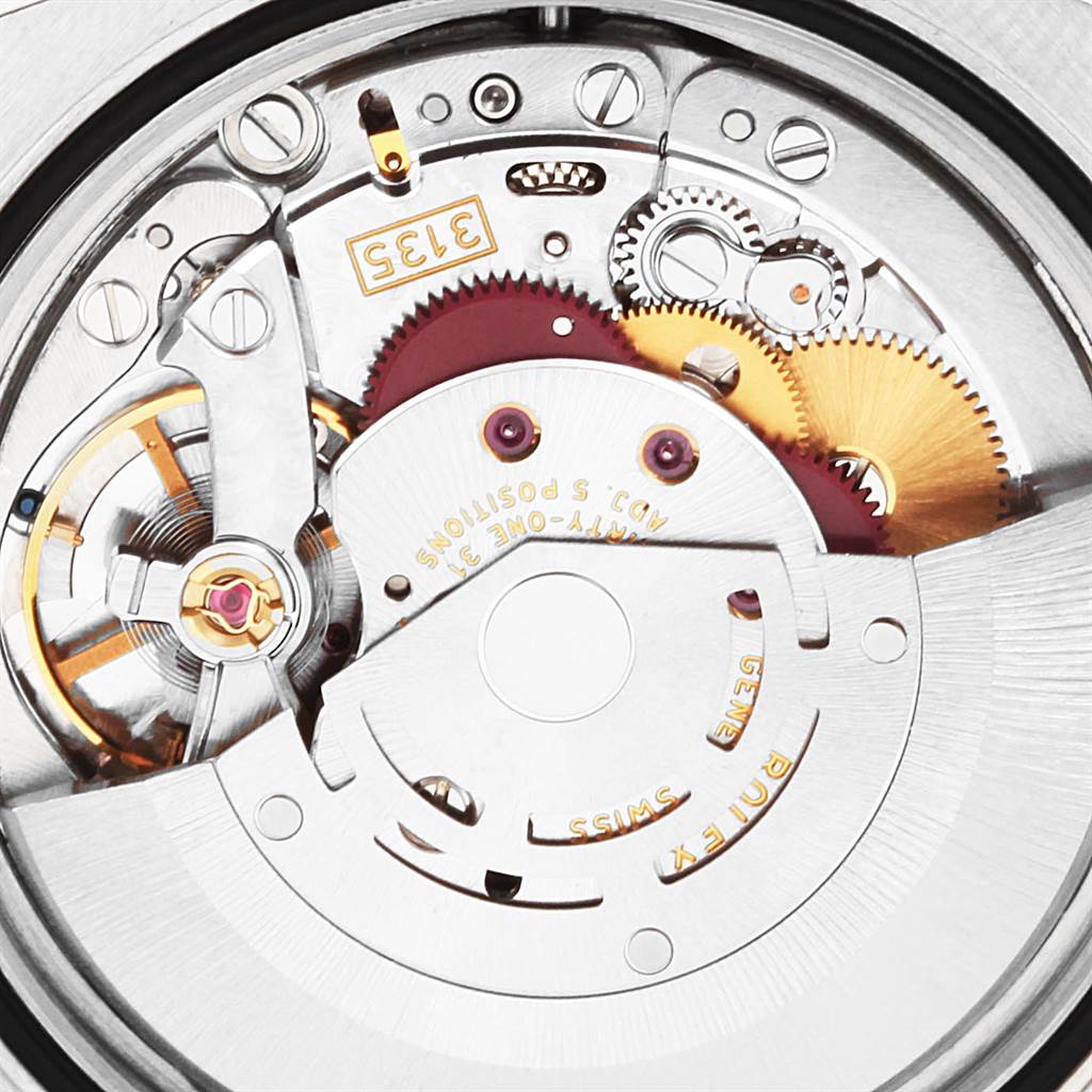 This image shows the internal movement mechanism of the Rolex Datejust 116234 Men's Stainless Steel Silver Dial 116234 Men's Stainless Steel Silver Dial watch, highlighting gears and other intricate components.