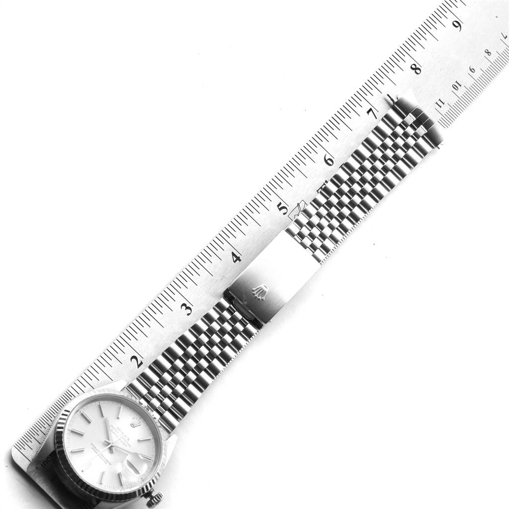The image shows a top-down view of a Rolex Datejust 16234 Men's Stainless Steel Silver Dial 16234 Men's Stainless Steel Silver Dial watch and its bracelet measured against a ruler.