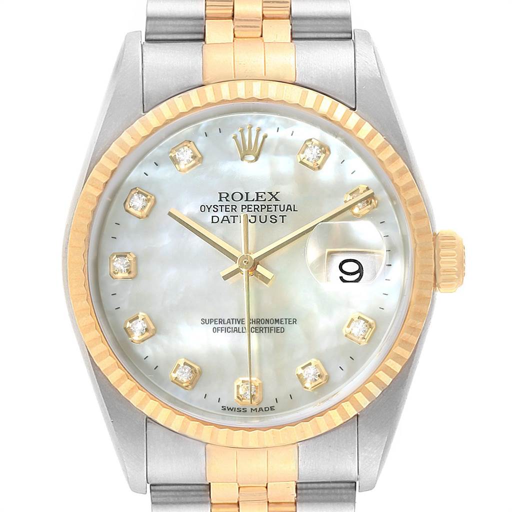 This is a close-up of the face and part of the bracelet of a Rolex Datejust 16233 Men's Steel and Gold (two tone) Mother of Pearl Dial 16233 Men's Steel and Gold (two tone) Mother of Pearl Dial watch, showing the dial, hands, date window, and bezel.