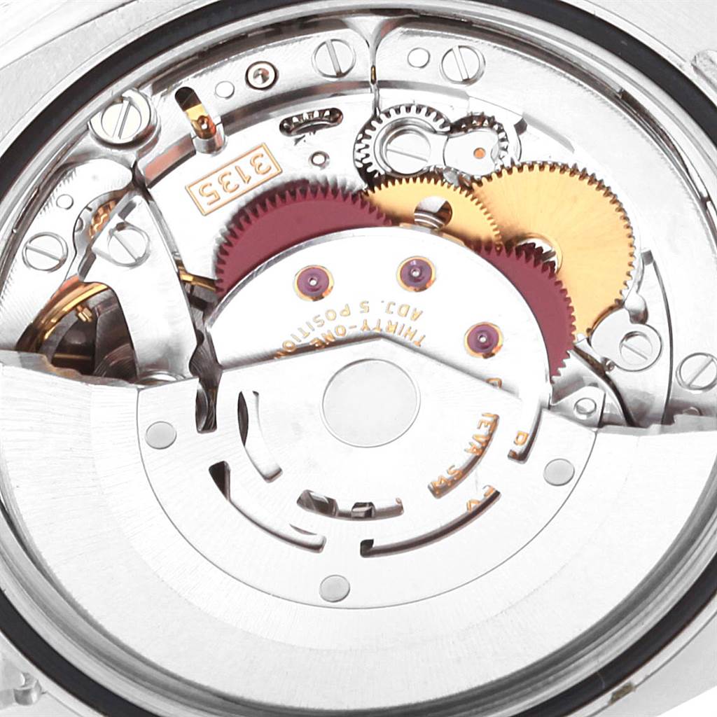 This image shows the inner mechanical movement components of a Rolex Datejust 116231 Men's Steel and Gold (two tone) Pink Dial 116231 Men's Steel and Gold (two tone) Pink Dial watch at a close-up angle.