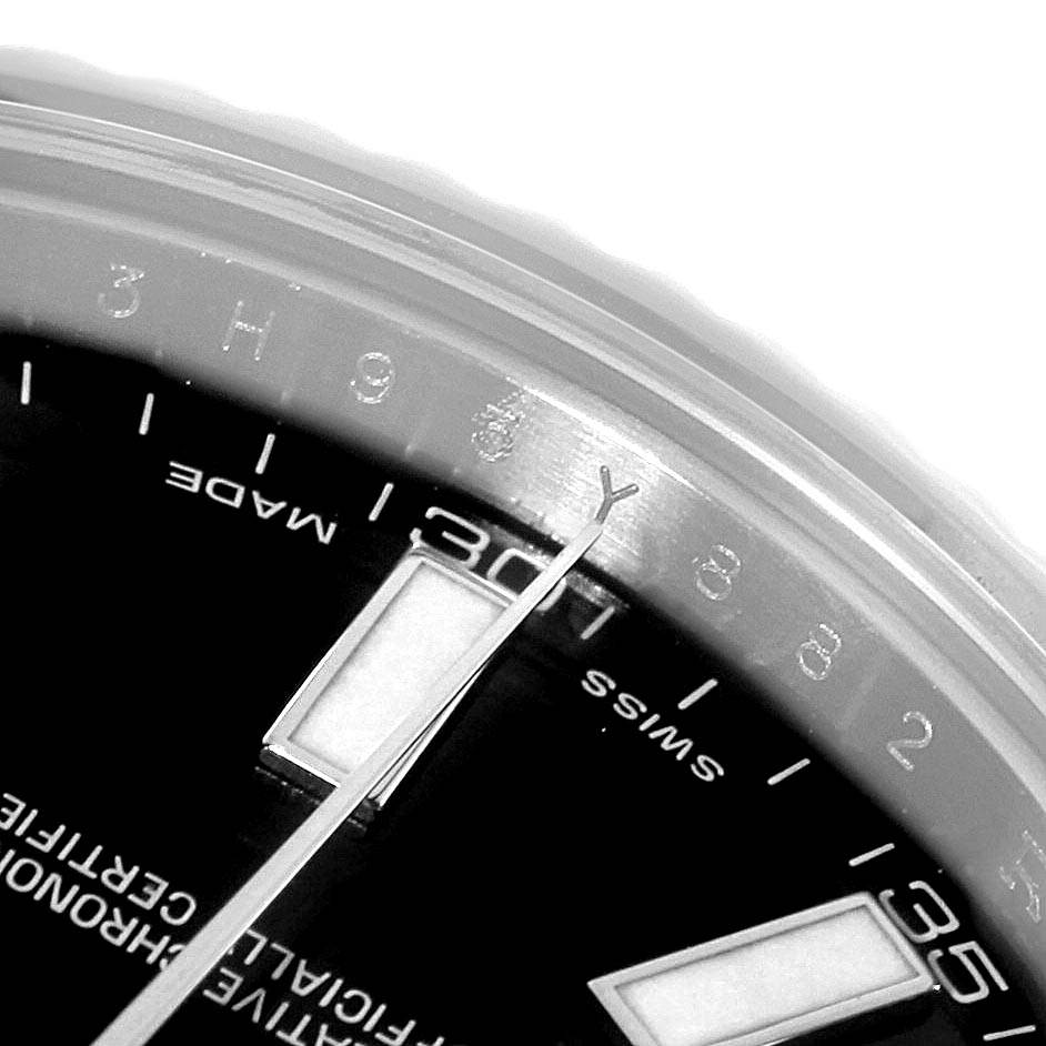 The image shows a close-up of the dial and the hands of a Rolex Datejust 116334 Men's Stainless Steel Black Dial 116334 Men's Stainless Steel Black Dial watch.