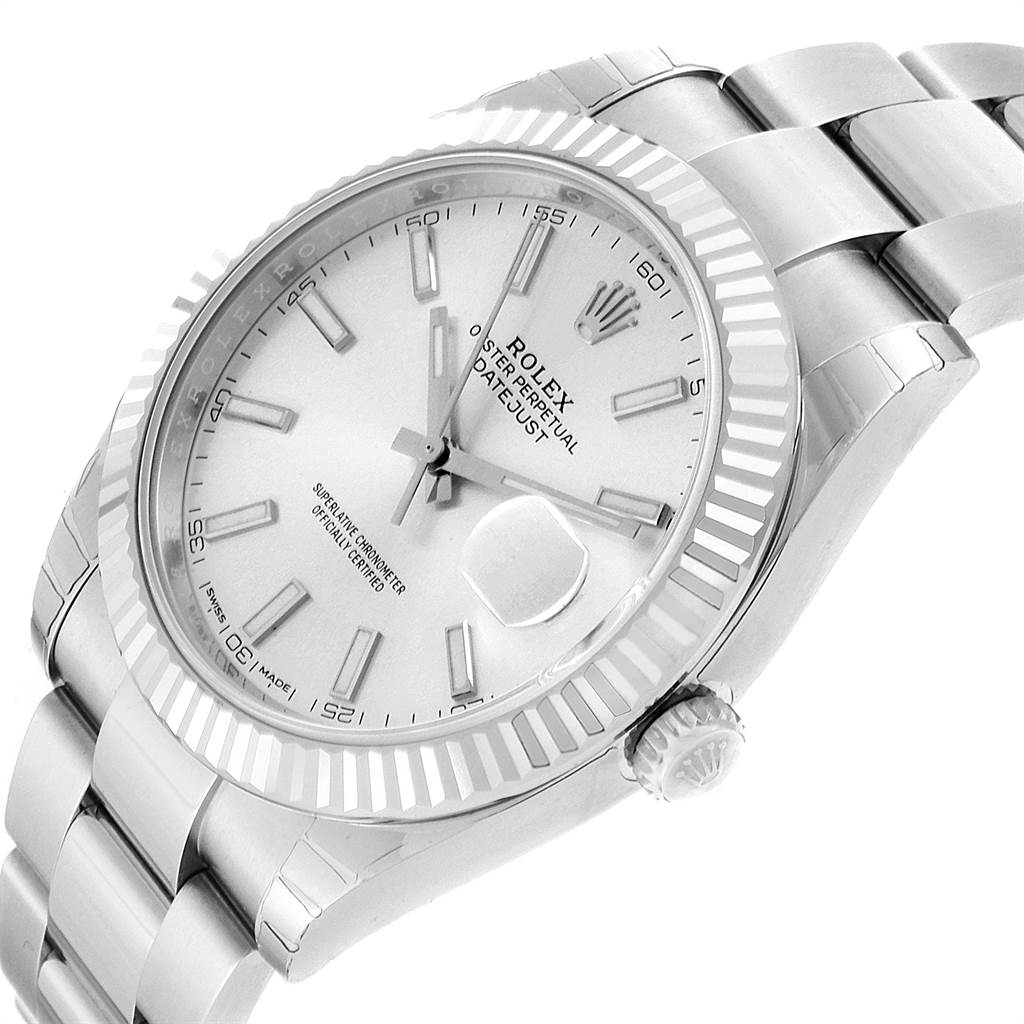The Rolex Datejust 126334 Men
s Stainless Steel Silver Dial 126334 Men
s Stainless Steel Silver Dial watch is shown at an angled close-up, displaying its face, bezel, crown, and part of the bracelet.