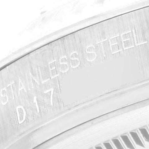 This image shows a close-up of the side engraving on the bezel of a Rolex Datejust 116234 Men
s Stainless Steel Mother of Pearl Dial 116234 Men
s Stainless Steel Mother of Pearl Dial watch, indicating it
s made of stainless steel.