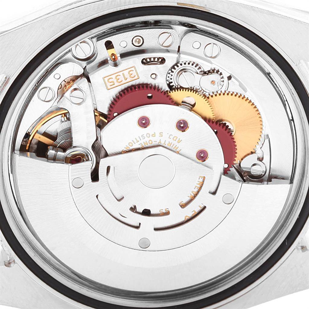 This image shows a close-up view of the movement components inside a Rolex Datejust 116234 Men
s Stainless Steel Mother of Pearl Dial 116234 Men
s Stainless Steel Mother of Pearl Dial watch.