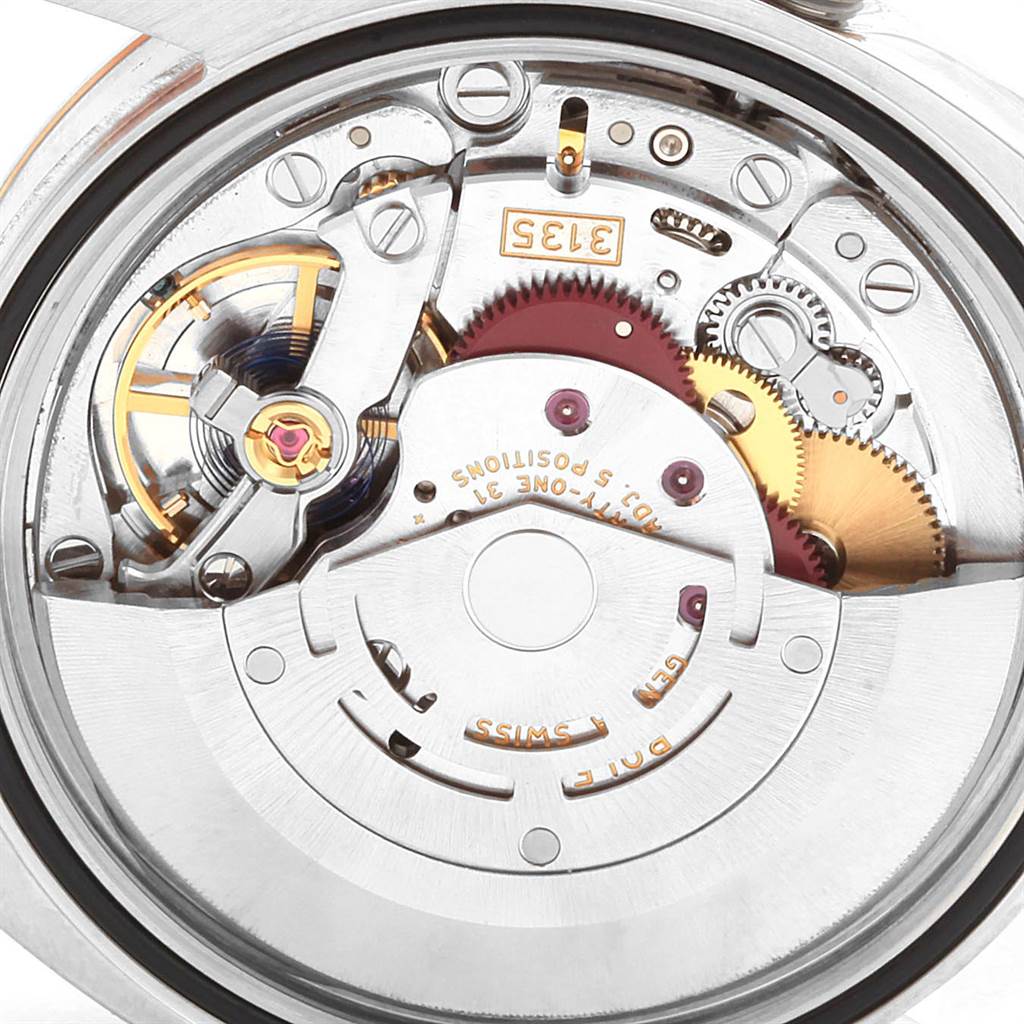 The image shows the inner movement mechanism of a Rolex Datejust 116231 Men's Steel and Gold (two tone) Pink Dial 116231 Men's Steel and Gold (two tone) Pink Dial watch, viewed from the back.