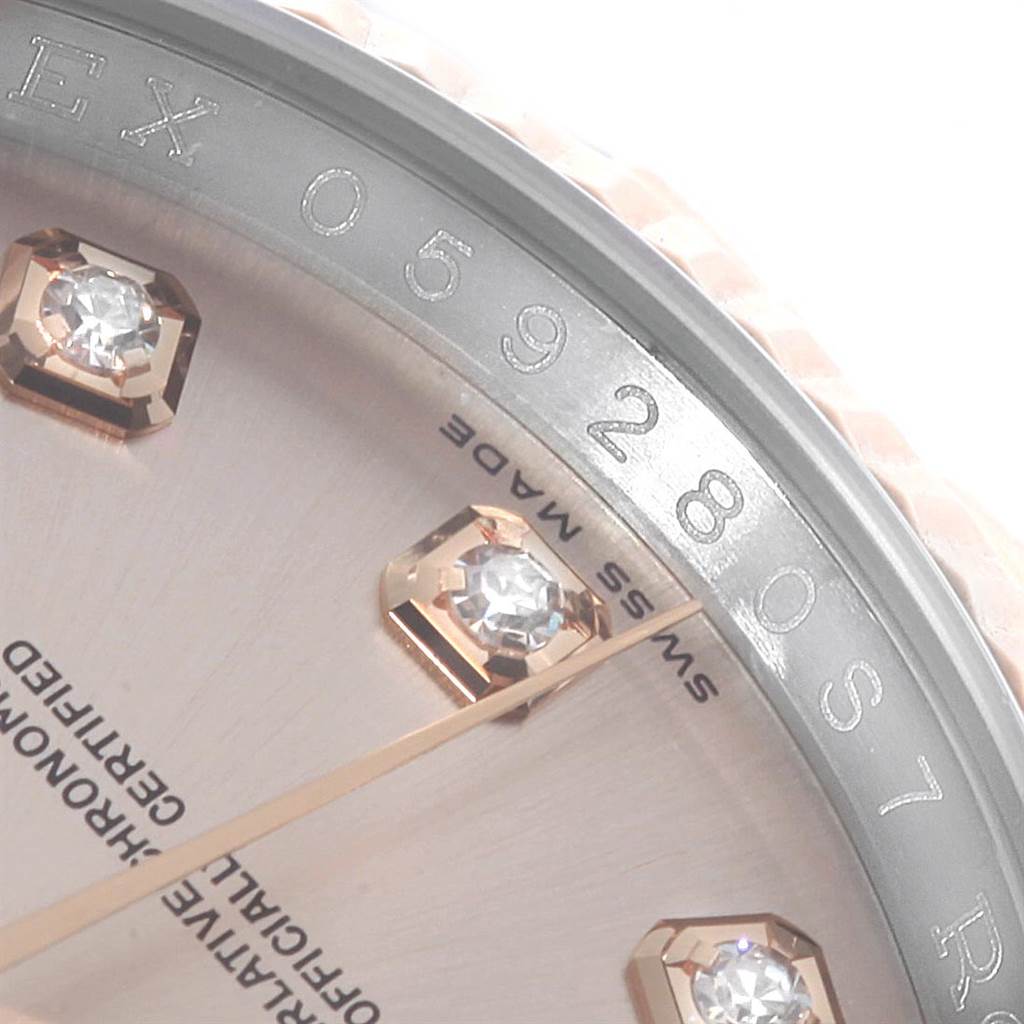 The image shows a close-up angle of the dial, bezel, and diamond hour markers of a Rolex Datejust 116231 Men's Steel and Gold (two tone) Pink Dial 116231 Men's Steel and Gold (two tone) Pink Dial watch.