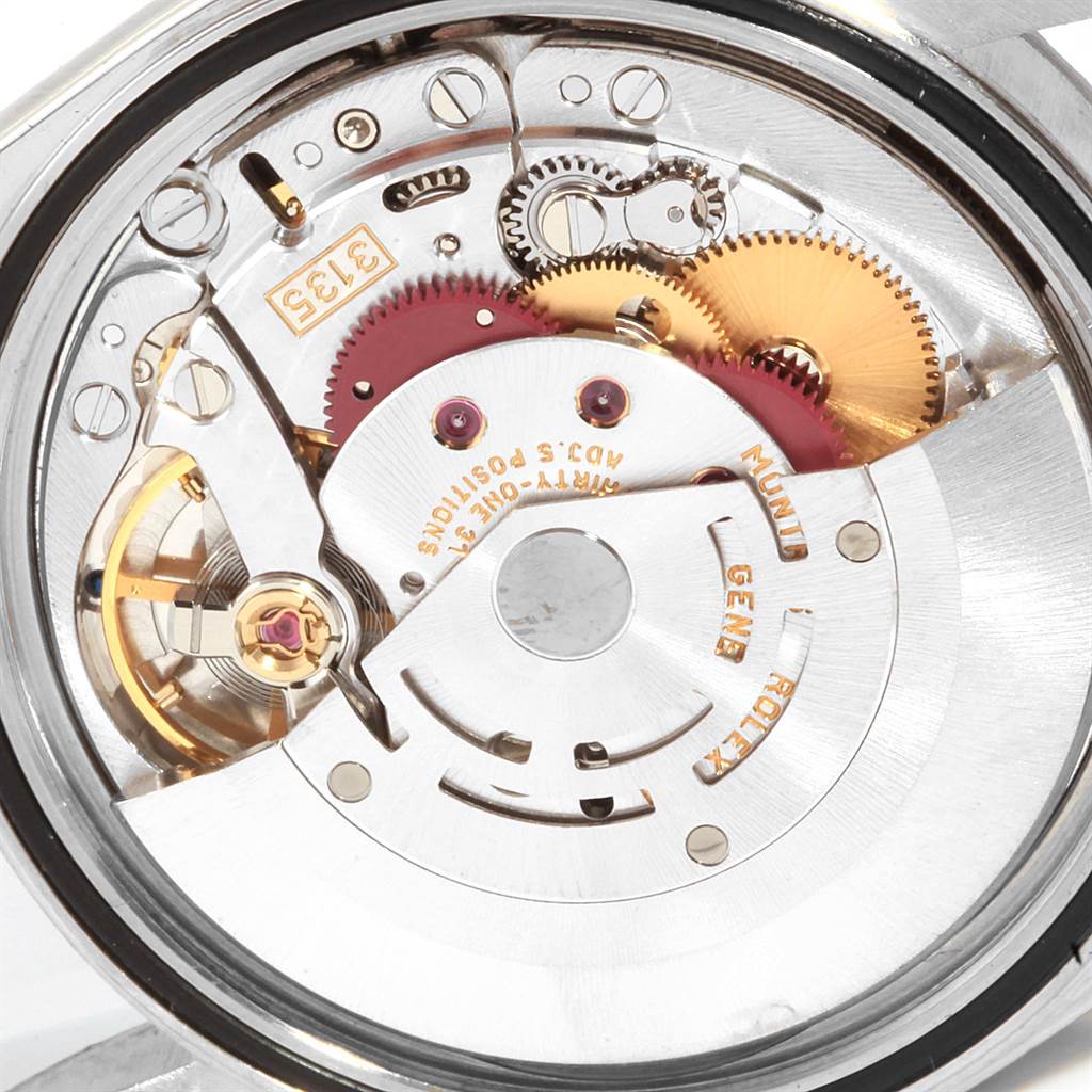 This image shows a close-up view of the movement and inner mechanism of a Rolex Datejust 16220 Men's Stainless Steel White Dial 16220 Men's Stainless Steel White Dial watch.